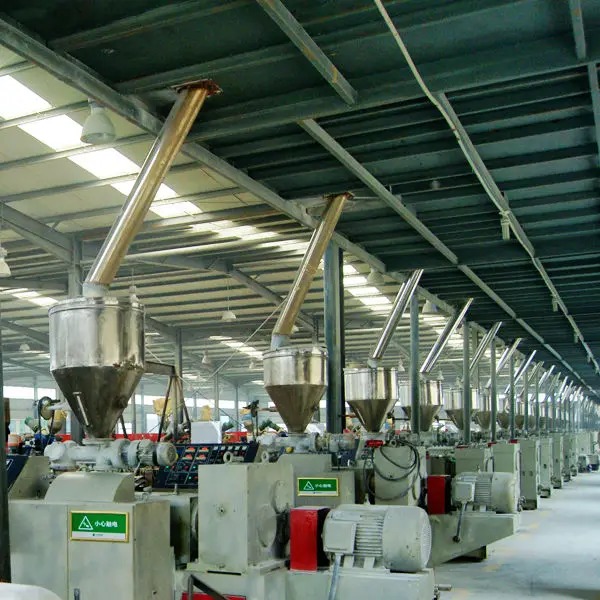 Multi-chambered extrusion profile raw feeder